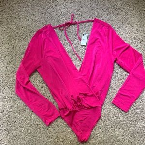 Bright pink bodysuit